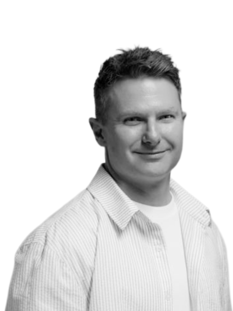 A black and white photo of Blair Alexander,CEO of OMD New Zealand