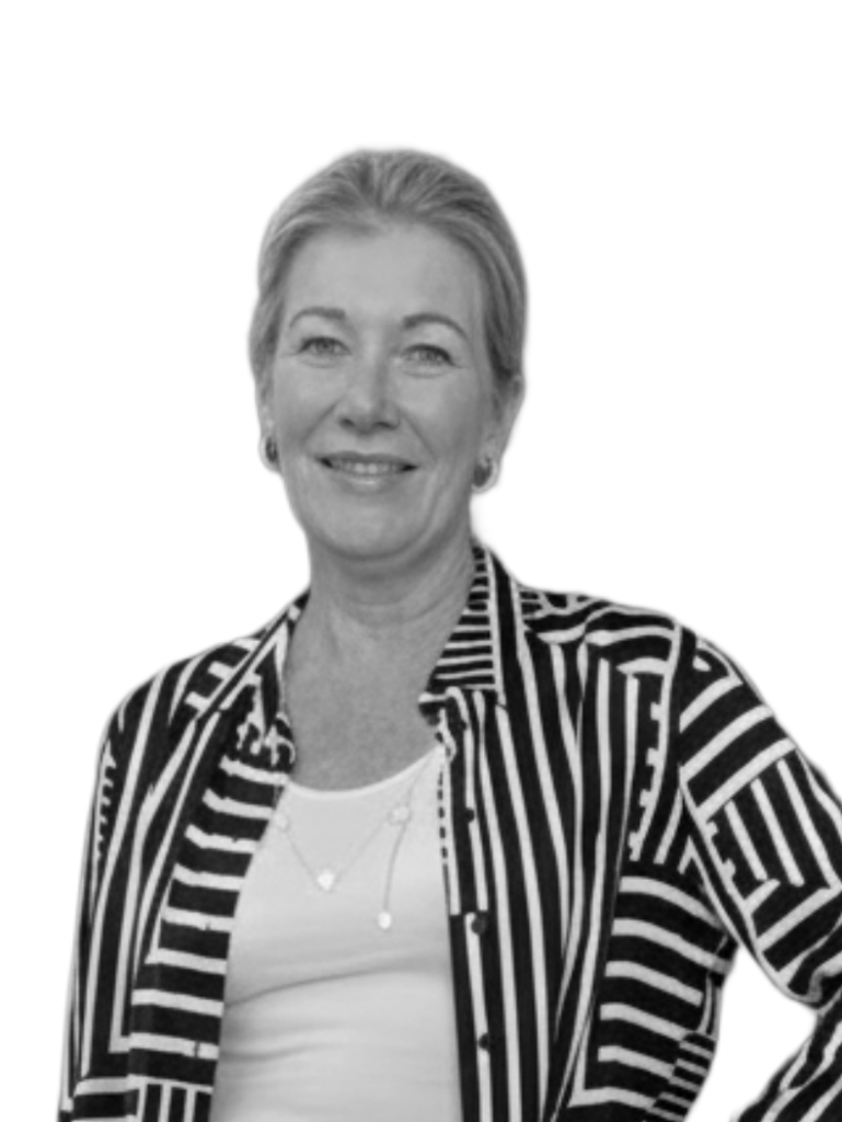 A black and white photo of Sue McCrea, General Manager of OMD Christchurch.